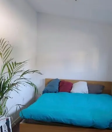 Maison En Bois Au Fond Du Jardin Holiday home *